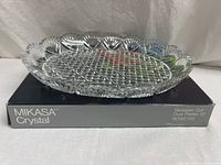 Oval crystal platter on its original Mikasa Crystal box showing the detailed cut pattern and scalloped edges.