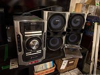 Full view of Sony hi-fi system with dual large speakers and media in front