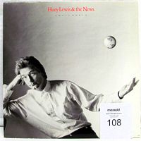 Front cover of the Small World album by Huey Lewis and The News, showing the original artwork featuring Huey Lewis in black and white with a small Earth image.