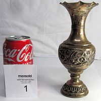 Front view of vase with Coca-Cola can for scale