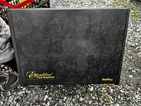 Closed dehydrator unit showing Excalibur logo on the top lid.