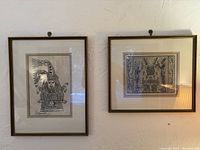 Overview of both framed prints hanging side-by-side on a wall showing complete presentation and framing.