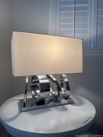 Front view of lamp on round side table