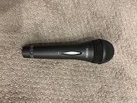 Top view of Sony F-V420 microphone showing grille and body.