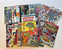 Top view of comic books spread showing various titles and covers