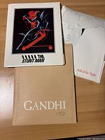 Three folders for film press kits and production notes for The Stunt Man, Still of the Night, and Gandhi
