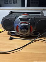 Front view of Sony CFD-G55 boom box showing speakers and power drive woofer.