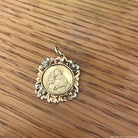 Front view of medallion on wood surface