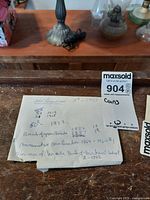 Handwritten notes listing various Canadian coin years and values including 1953, 1852, 1874, and others.