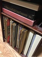 Photo of shelf with multiple vinyl records and boxed set 'Music of the World's Great Composers'.