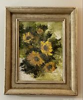 Framed oil painting on board showing an impressionistic sunflower bouquet in yellow tones, surrounded by a vintage gold wooden frame.