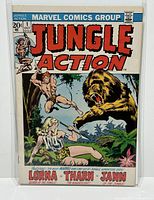Front cover of Marvel Jungle Action #1 comic book showing title, characters Tharn, Lorna, and Jann, roaring bear, and jungle setting.