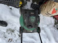 Front view of the green Certified lawn mower with visible engine labeled 150cc OHV.