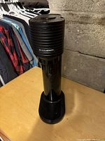 Front view of assembled black SodaStream carbonated water maker.