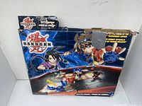 Front of Bakugan Battle Brawlers Battle Arena box showing anime characters and arena illustration