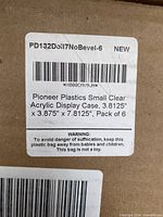 Label on box showing item brand, model, and dimensions, stating 'Pioneer Plastics Small Clear Acrylic Display Case, 3.8125" x 3.875" x 7.8125", Pack of 6'.