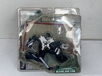 Front view of the McFarlane SportsPicks hockey goalie figure in packaging, showing Dallas Stars uniform and goalie gear.