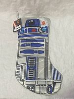 Full view of R2D2 Christmas stocking showing front illustration and hanging loop