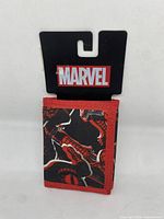 Front view of Marvel Spider-Man wallet showing detailed Spider-Man graphic and red trim.