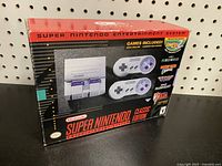 Box of the Super Nintendo Classic Edition showing branding, game titles included, and condition of packaging.