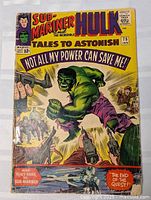 Front cover of the comic showing Hulk and Sub-Mariner with action scene and title details.