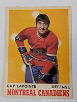 Front of the 1970-71 O-Pee-Chee Guy Lapointe rookie card showing player image and team details.