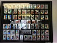 Full view of the large black frame holding the complete set of McDonald's 2002/2003 Prism Platinum hockey cards, arranged in neat rows with a central logo plaque.