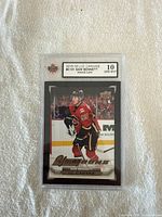 Front of the Sam Bennett Young Stars Rookie Card graded Gem Mint 10 by KSA, showing the player in uniform on ice.
