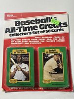 Photo showing sealed red packaging of 1987 Baseball All-Time Greats collector's set with images of Henry Aaron and Mickey Mantle on front.