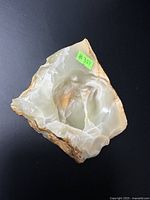 Close-up image of one natural stone piece with hollow and rough exterior