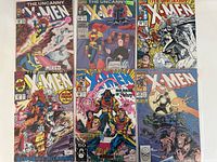 All six comics laid out showing front covers with various X-Men characters and Marvel branding, vintage condition with wear signs.