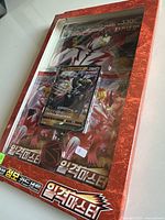 Front angled view of the sealed Korean Pokemon Sword & Shield Single Strike Master Jumbo Set showing promo V and VMAX cards and included coin.