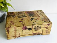 Top and side view of the vintage wood box showing floral design