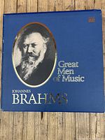 Blue box with Johannes Brahms portrait and 'Great Men of Music' title.