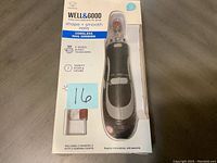 Photo of the boxed product showing brand, usage, and features including 2-speed (6,500 / 13,000 RPM), safety stop and cover, and inclusion of sanding drums.