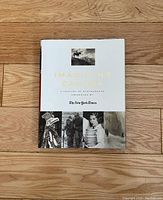 Front cover of Imagining Canada book with white dust jacket and photographic collage