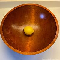 Top view of Baribocraft maple bowl with lemon for scale