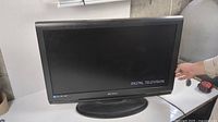 Black Emerson 32-inch LCD digital television powered off with no remote shown. Screen and bezel in good visible condition.