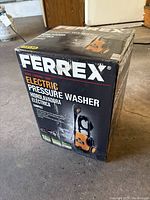 Photo of the box showing Ferrex electric pressure washer branding and compact model details.