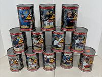 12 sealed 1997 Pinnacle Inside baseball card tins stacked in pyramid showcasing player labels and branding