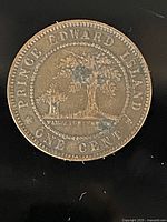 Reverse side of the coin showing two trees and 'Prince Edward Island One Cent' inscription.