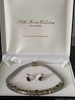 Overview photo of handmade Fifth Avenue Collection necklace and pierced earrings in original presentation box