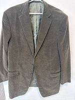 Front full view of the green corduroy Ermenegildo Zegna men's jacket on a hanger showing overall condition and color.