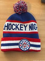 Photo of front of beanie showing 'Hockey Night' text and Hockey Night Canada patch