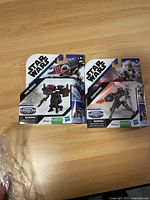 Front view of two Star Wars Mission Fleet action figures, Dark Trooper and Stormtrooper, in sealed original packaging.