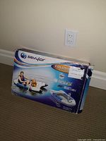 Photo of the original box for the Sevylor Colossus 2 Person Inflatable Boat showing branding and product images.