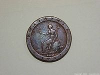 Reverse of 1797 penny coin showing seated Britannia design and date