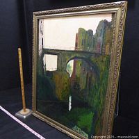 Full view of painting and frame with ruler for scale