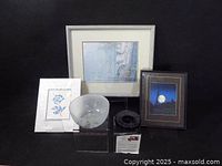 Full lot showing two etched glass bowls and three framed prints with Indigenous art motifs.