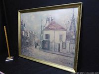 Full view of framed print showing the street scene and overall condition.